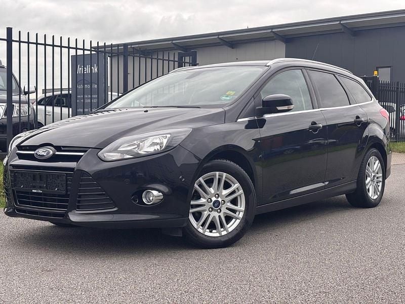 Schwarz Gebraucht 2014 Ford Focus Titanium Kombi | 2.950 € (Superpreis) - Bild 1/4