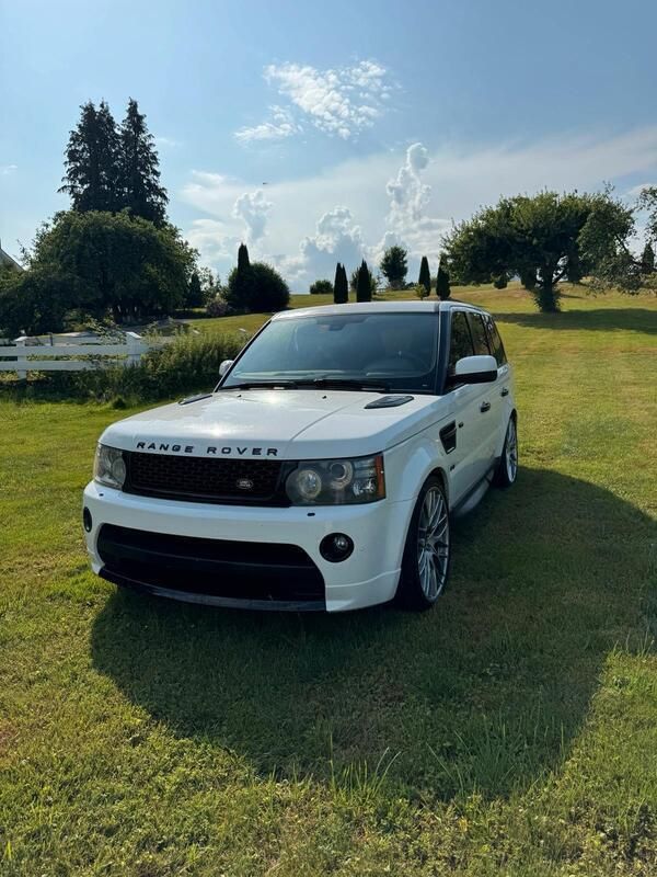 Weiß Gebraucht 2011 Land Rover Range Rover Sport SUV | 28.899 € - Bild 1/4