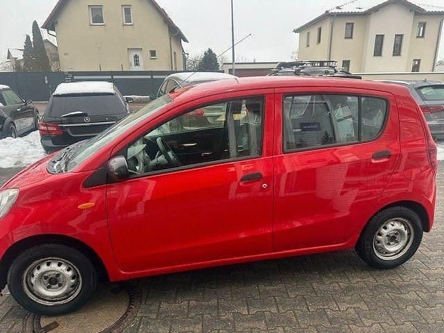 Gebraucht Daihatsu Cuore 69 PS (50 kW) 2009 Rot Kleinwagen