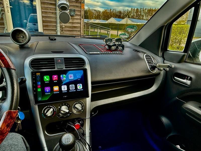 Gebraucht Opel Agila 68 PS (50 kW) 2014 Weiß Kleinwagen