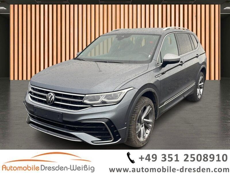 Grau platinum grey (metallic) Gebraucht 2024 VW Tiguan Allspace R-line SUV | 41.880 € (Guter Preis) - Bild 1/3