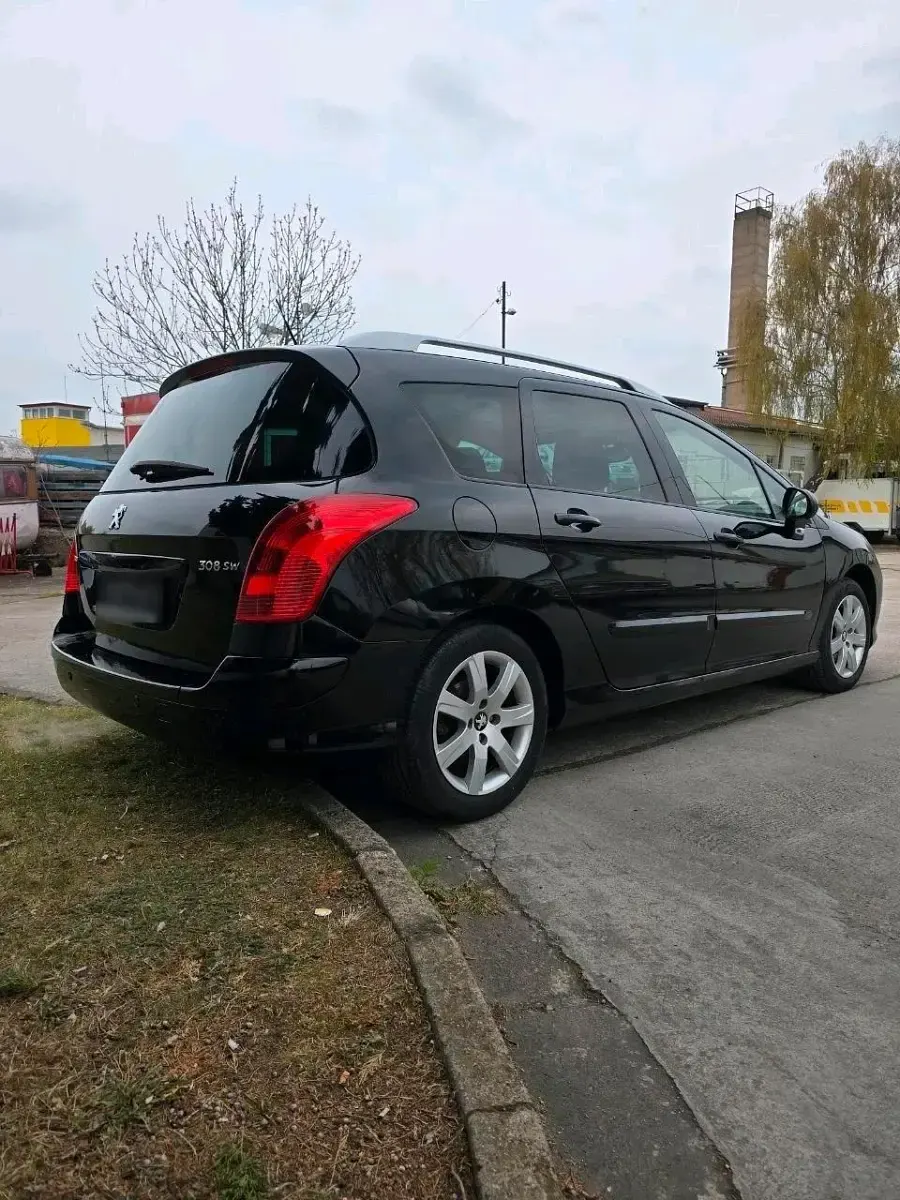 Gebraucht Peugeot 308 SW 156 PS (114 kW) 2011 Schwarz Kombi