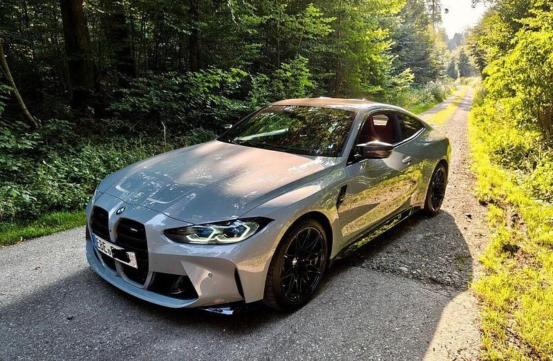 Grau Gebraucht 2020 BMW M4 Performance Coupé | 67.999 € - Bild 1/4