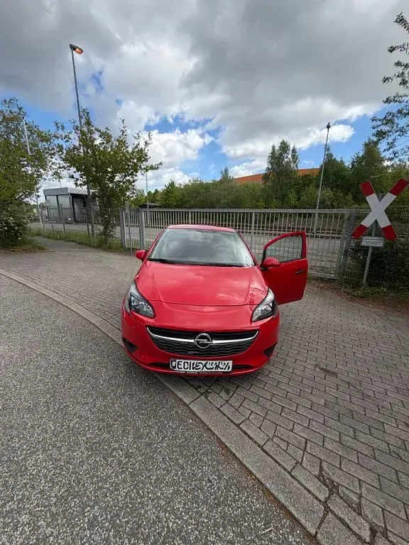 Usado Opel Corsa Selection 69 HP (50 kW) 2017 Vermelho Citadino
