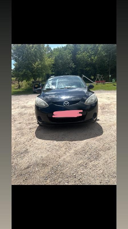Gebraucht Mazda 2 75 PS (55 kW) 2009 Schwarz Kleinwagen