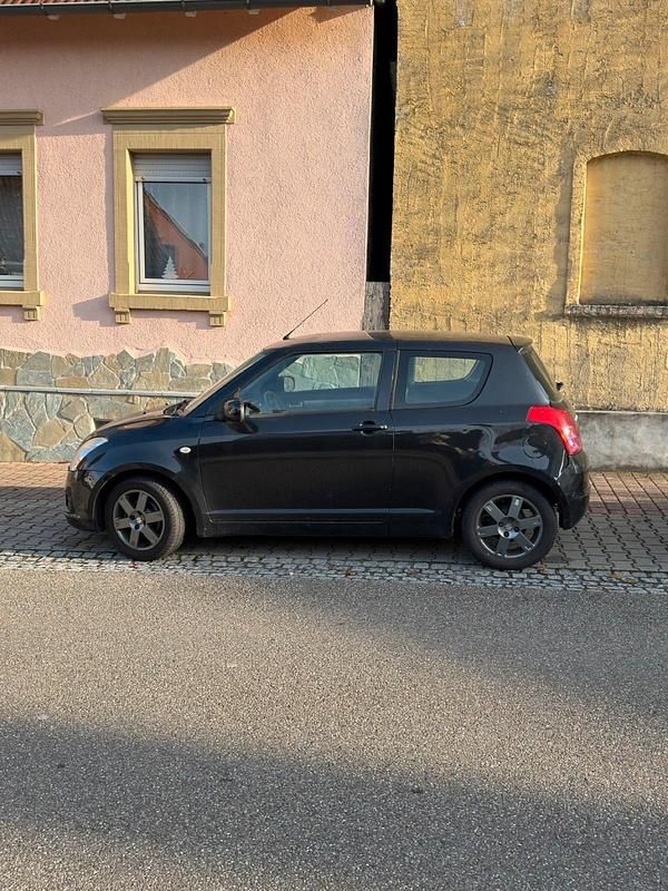 Gebraucht Suzuki Swift 90 PS (66 kW) 2010 Schwarz Kleinwagen