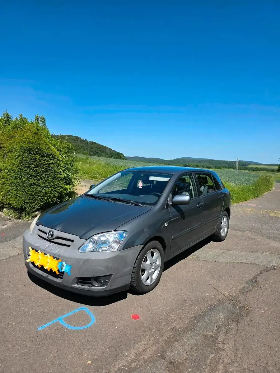 Używany Toyota Corolla 115 KM (84 kW) 2006 Szary Hatchback