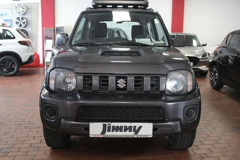 Grau Gebraucht 2014 Suzuki Jimny Club SUV | 15.900 € (Etwas zu teuer) - Bild 1/4
