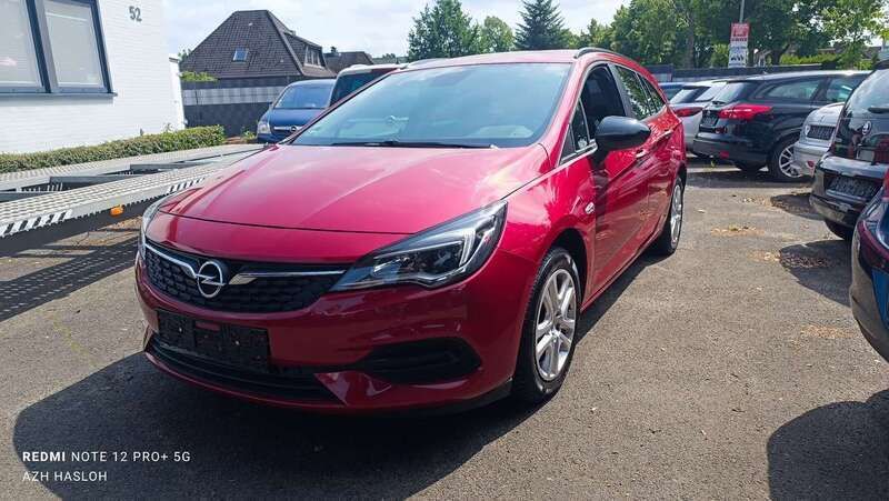 Chili rot/kardio rot Gebraucht 2021 Opel Astra Edition Kombi | 13.900 € (Superpreis) - Bild 1/4