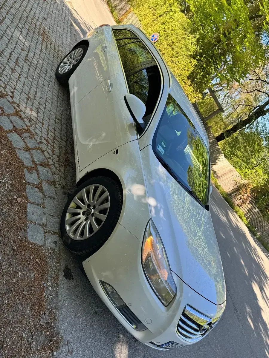 Second-hand Opel Insignia 131 CP (96 kW) 2010 Alb Break