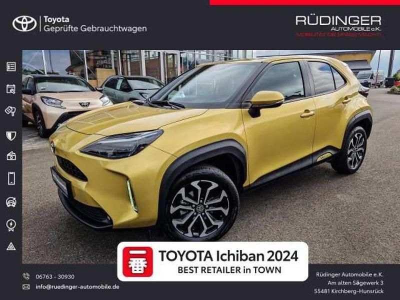 Warm gold metallic Gebraucht 2021 Toyota Yaris Hybrid Connect Style SUV | 22.800 € (Fairer Preis) - Bild 1/4