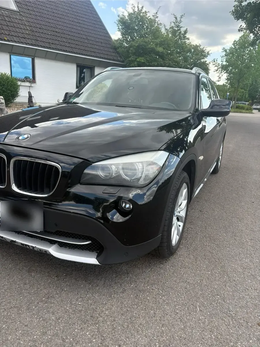 Second-hand BMW X1 184 CP (135 kW) 2012 Negru SUV