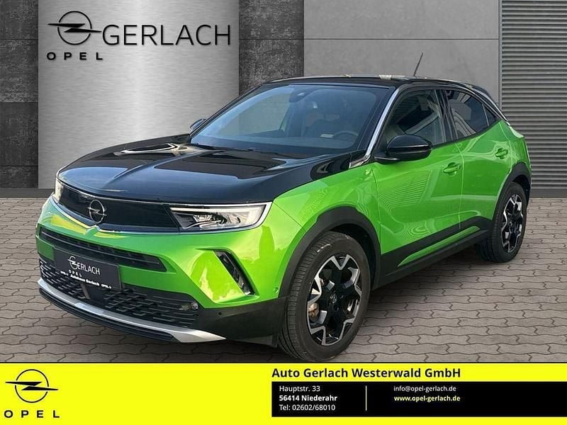 Mamba green met Gebraucht 2022 Opel Mokka-e Ultimate SUV | 19.500 € (Fairer Preis) - Bild 1/4