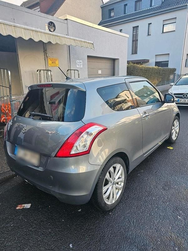 Gebraucht Suzuki Swift 94 PS (69 kW) 2015 Grau Kleinwagen