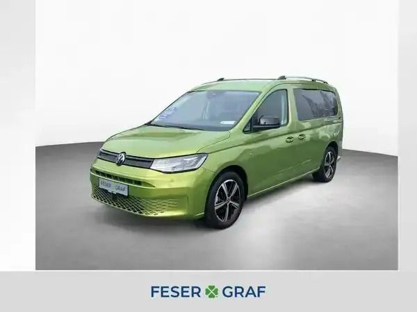 Golden green metallic Neu 2025 VW Caddy Maxi Van / Kleinbus | 50.300 € - Bild 1/4