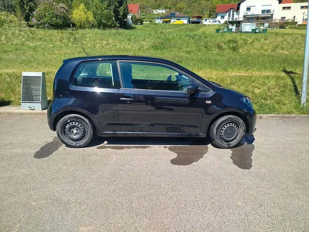 Używany Seat Mii 60 KM (44 kW) 2012 Czarny Hatchback