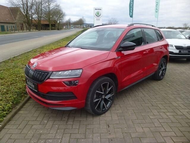 Velvetrot metallic Gebraucht 2021 Skoda Karoq SportLine SUV | 31.900 € (Fairer Preis) - Bild 1/2