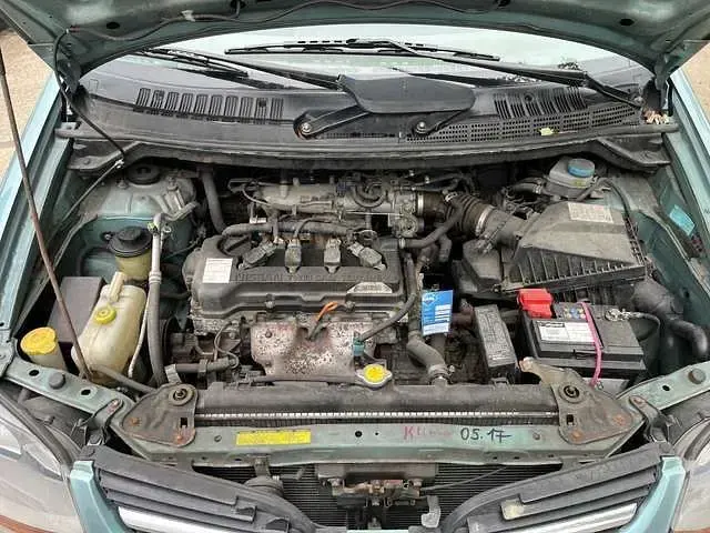 Gebraucht Nissan Almera Tino 114 PS (83 kW) 2001 Türkis Van / Kleinbus