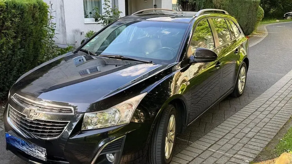 Gebraucht Chevrolet Cruze LS 124 PS (91 kW) 2013 Schwarz Limousine