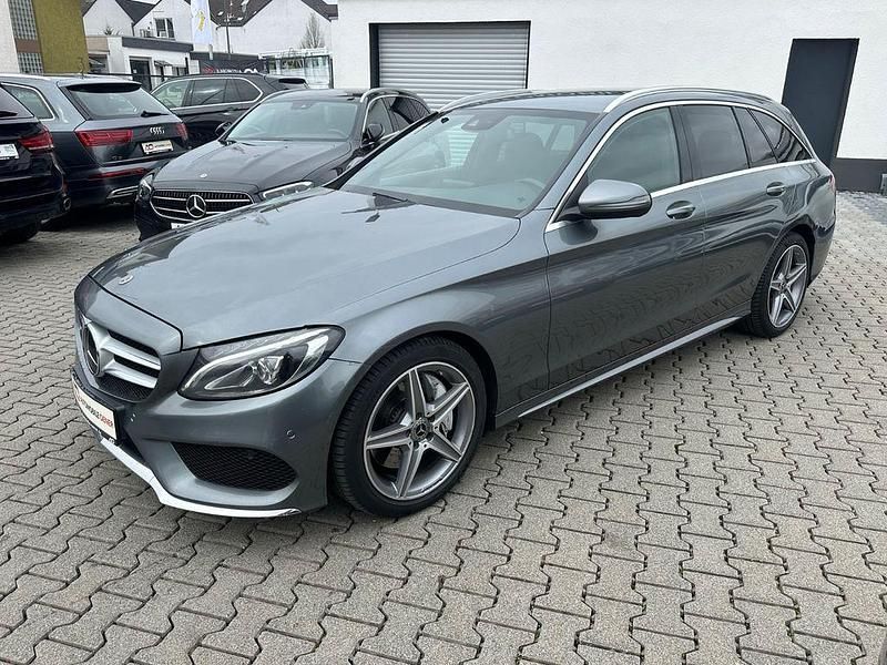 Grau Gebraucht 2017 Mercedes C250 AMG line Limousine | 14.999 € (Fairer Preis) - Bild 1/4