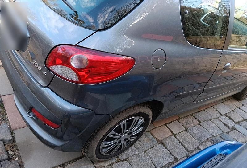 Gebraucht Peugeot 206+ 60 PS (44 kW) 2010 Grau Kleinwagen
