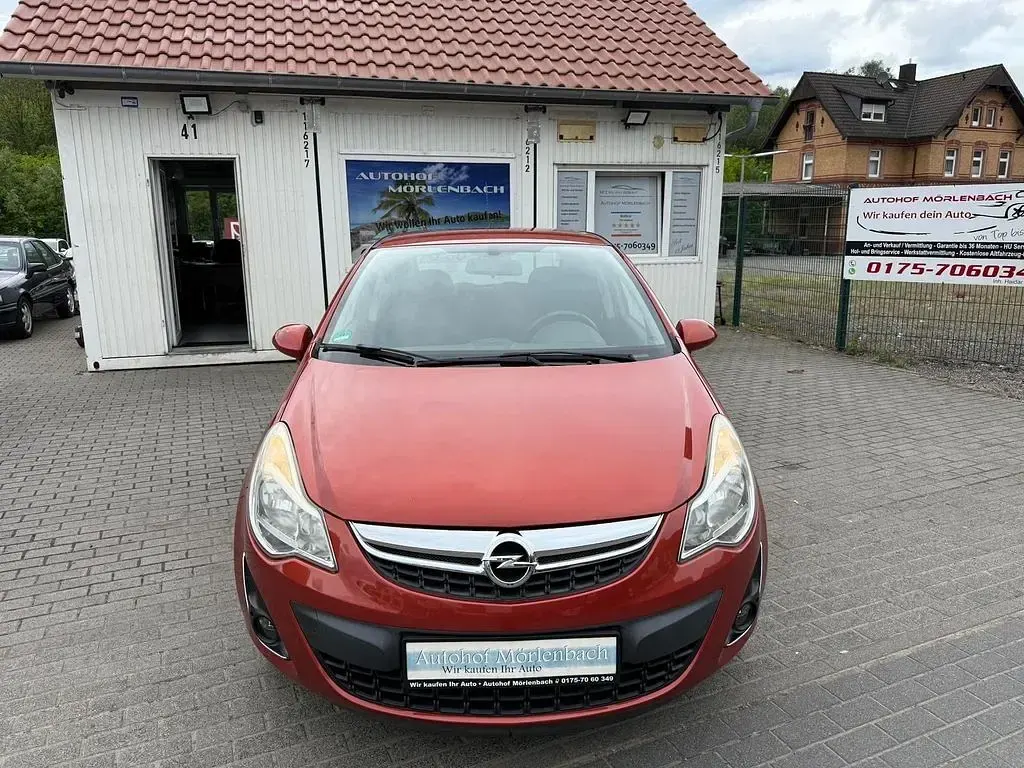 Gebraucht Opel Corsa Satellite 87 PS (63 kW) 2011 Orange Kleinwagen