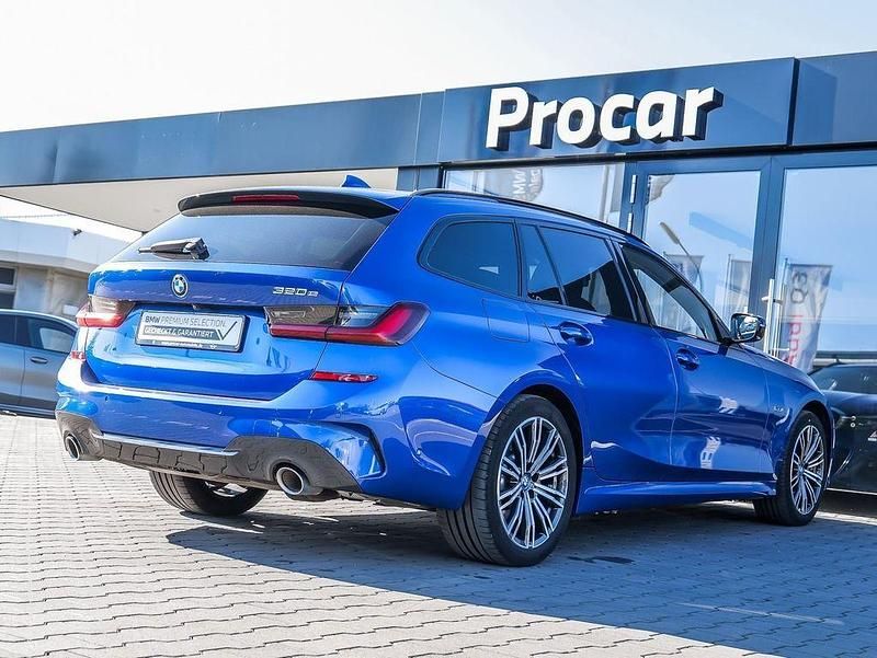 Gebraucht BMW 320e Performance 163 PS (119 kW) 2021 M portimao blau Kombi