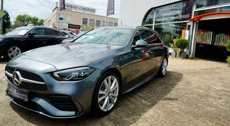 Grau Gebraucht 2022 Mercedes C220 AMG line Kombi | 35.800 € (Teuer) - Bild 1/4