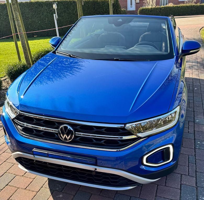 Blau Gebraucht 2024 VW T-Roc Cabriolet Style Cabrio | 29.500 € (Superpreis) - Bild 1/4