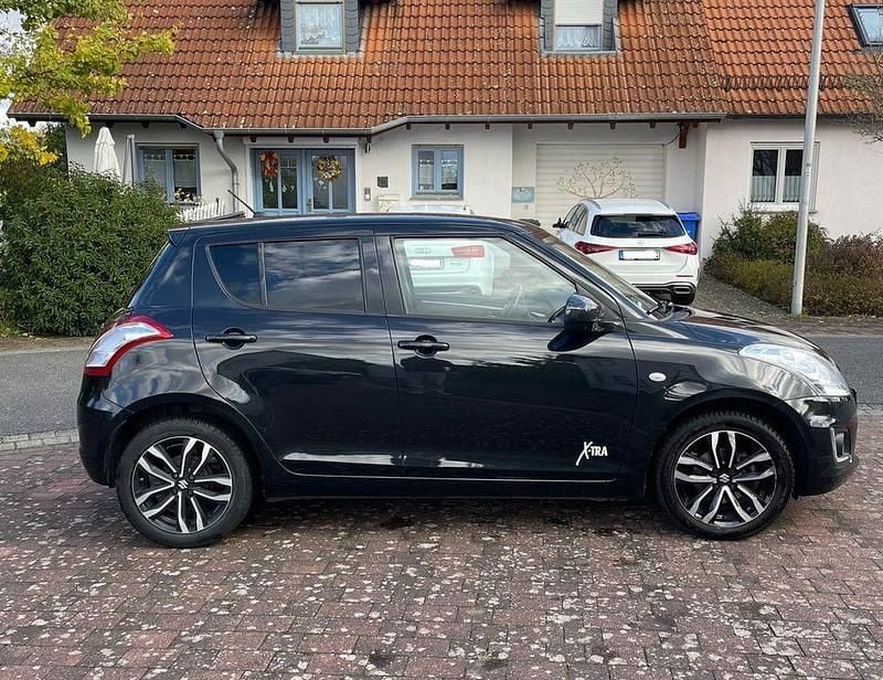Gebraucht Suzuki Swift X-TRA 94 PS (69 kW) 2016 Schwarz Kleinwagen