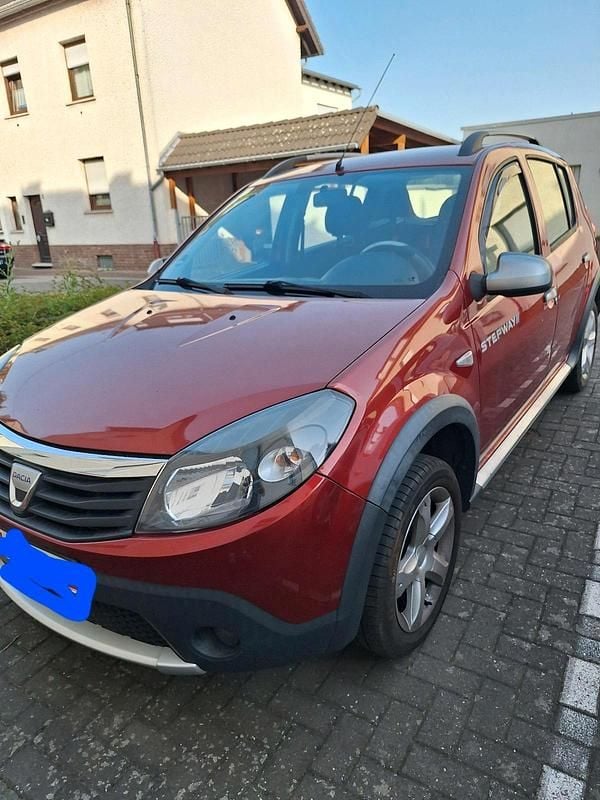 Rot Gebraucht 2011 Dacia Sandero Stepway Kleinwagen | 3.450 € - Bild 1/4