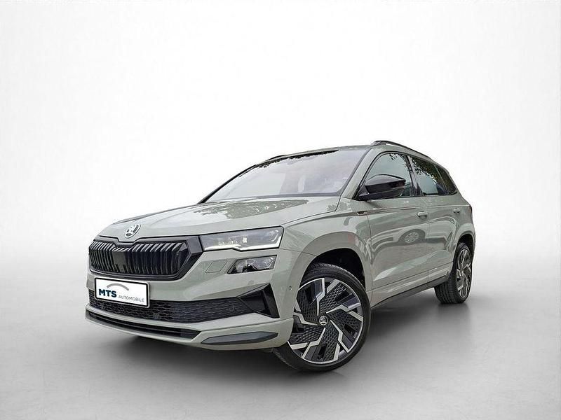 Grau Gebraucht 2022 Skoda Karoq SportLine SUV | 31.640 € (Teuer) - Bild 1/4