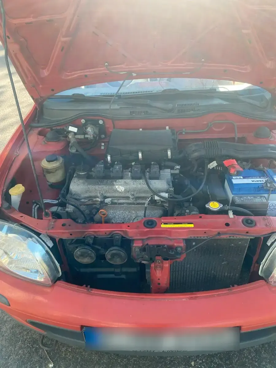 Used Nissan Micra 60 HP (44 kW) 2000 Red Hatchback