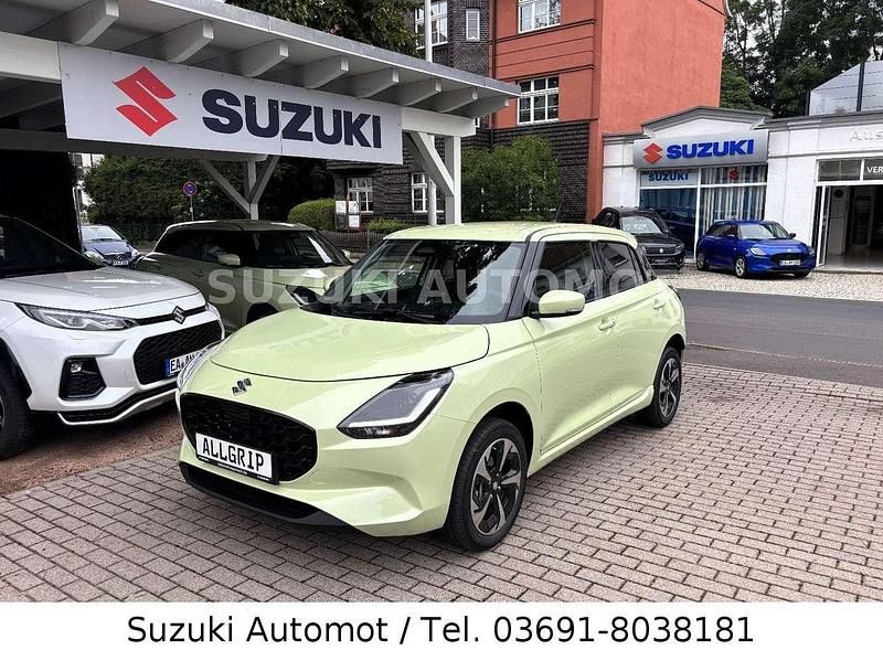 Cool yellow Neu 2025 Suzuki Swift Comfort+ Kleinwagen | 22.990 € - Bild 1/4