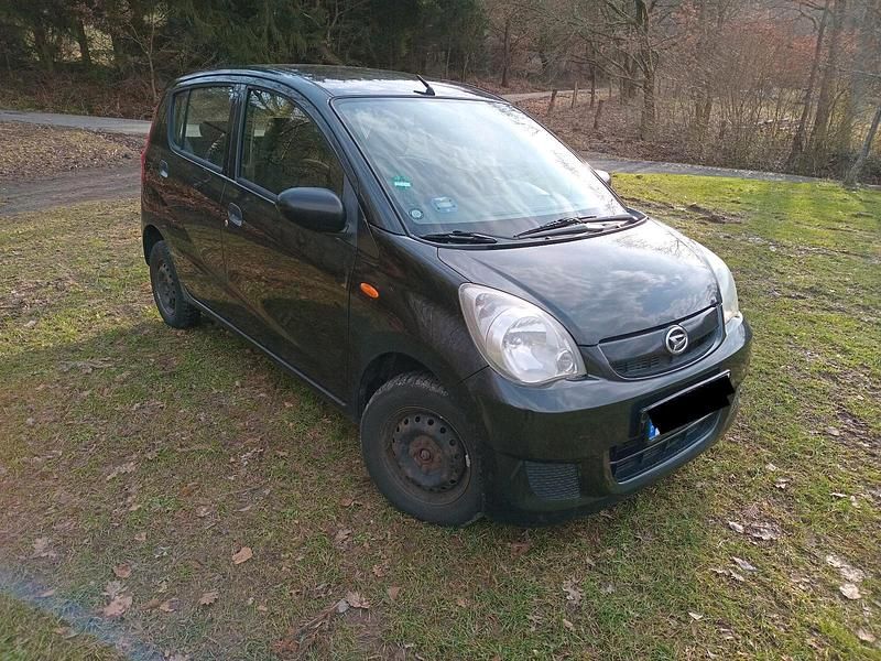 Gebraucht Daihatsu Cuore 69 PS (50 kW) 2009 Schwarz Kleinwagen