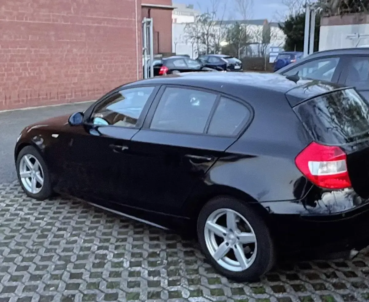 Gebraucht BMW 116 115 PS (84 kW) 2006 Schwarz Kleinwagen
