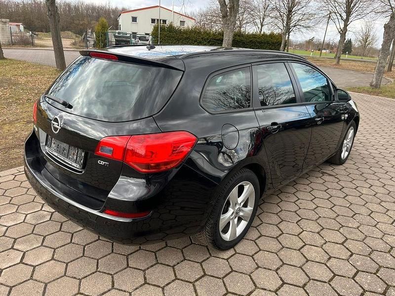 Gebraucht Opel Astra Edition 125 PS (91 kW) 2011 Schwarz Kombi