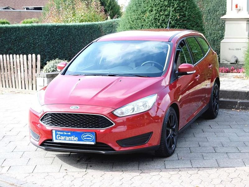 Red candy/candy red Gebraucht 2015 Ford Focus Trend Kombi | 5.900 € (Fairer Preis) - Bild 1/4