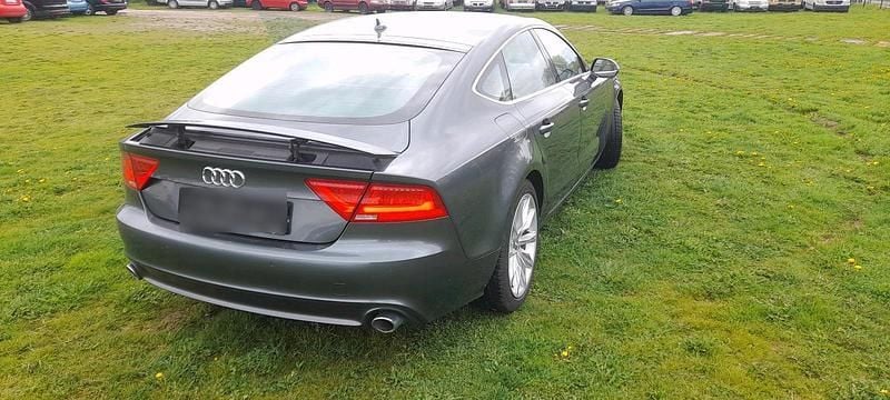 Grau Gebraucht 2012 Audi A7 Ambiente Kleinwagen | 12.300 € (Superpreis) - Bild 1/4