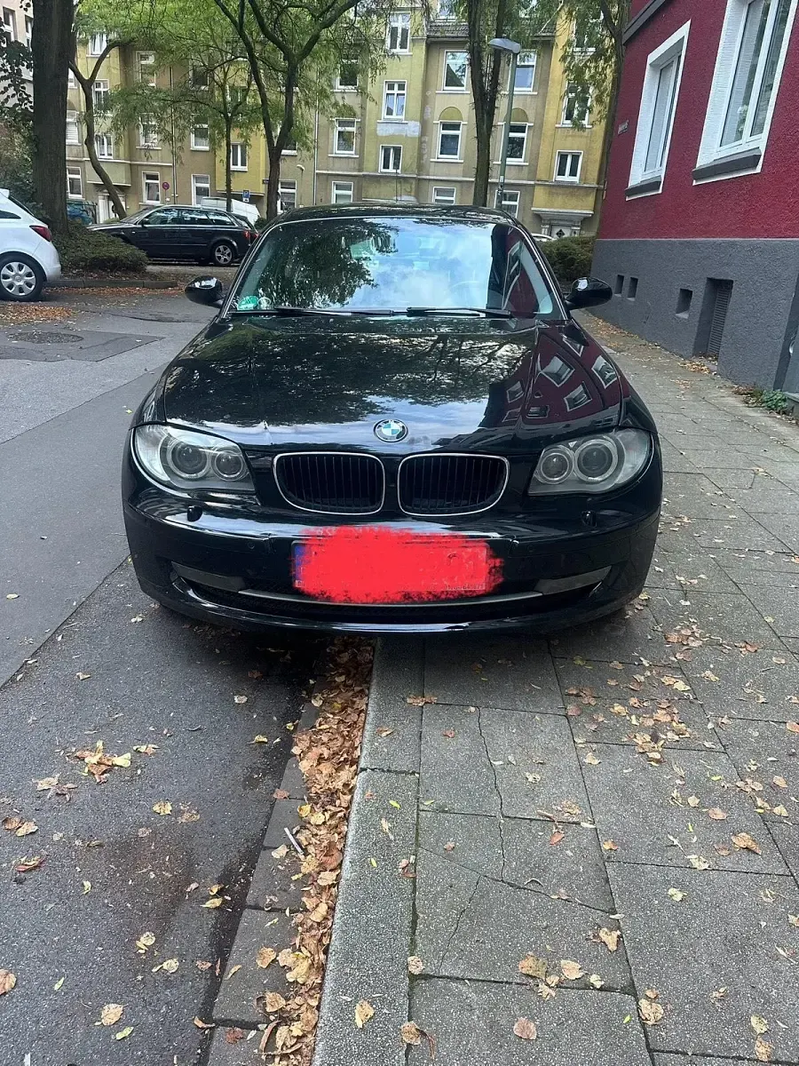 Second-hand BMW 116 122 CP (89 kW) 2009 Negru Hatchback