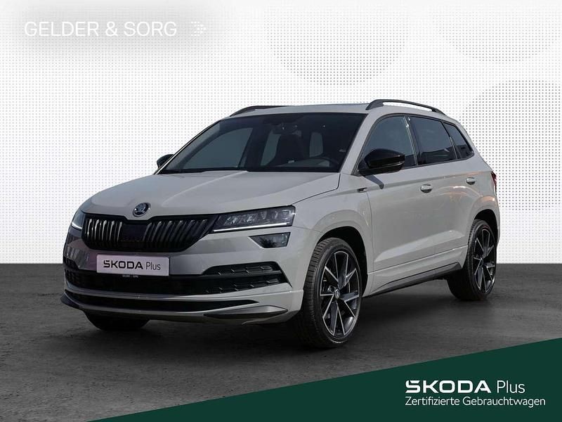 Grau Gebraucht 2021 Skoda Karoq SportLine SUV | 36.480 € (Teuer) - Bild 1/4