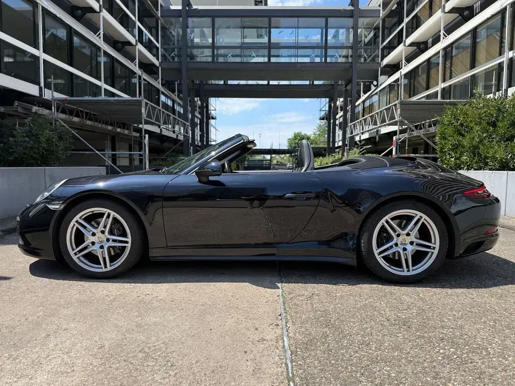 Gebraucht Porsche 911 Carrera Cabriolet 370 PS (272 kW) 2018 Tiefschwarz (metallic) Cabrio