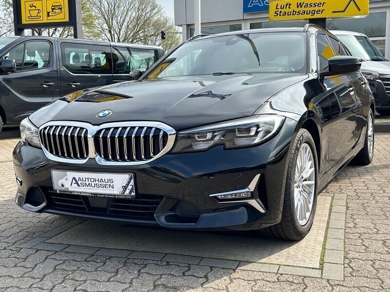 Schwarz Gebraucht 2020 BMW 320 Luxury Line Kombi | 26.590 € (Teuer) - Bild 1/4