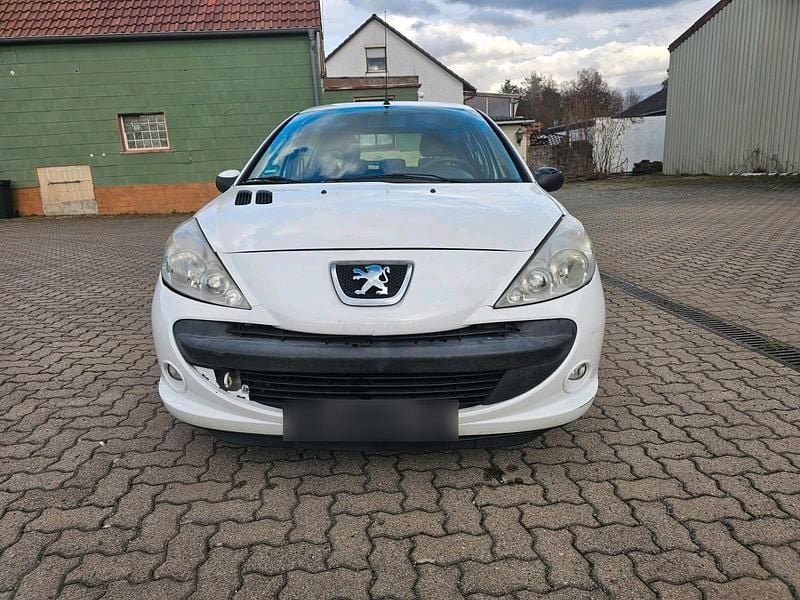Gebraucht Peugeot 206+ 73 PS (53 kW) 2011 Weiß Kleinwagen