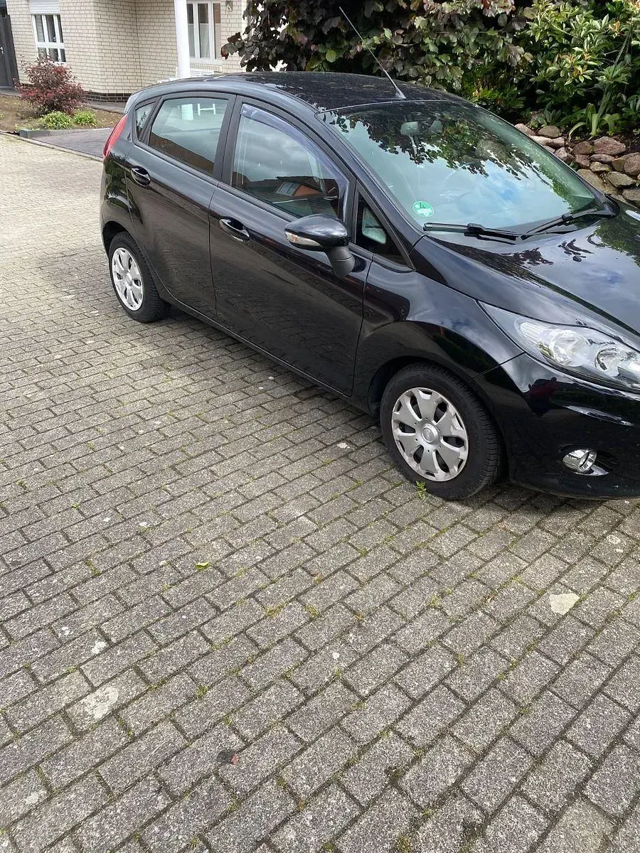 Gebraucht Ford Fiesta Trend 95 PS (69 kW) 2012 Schwarz Limousine