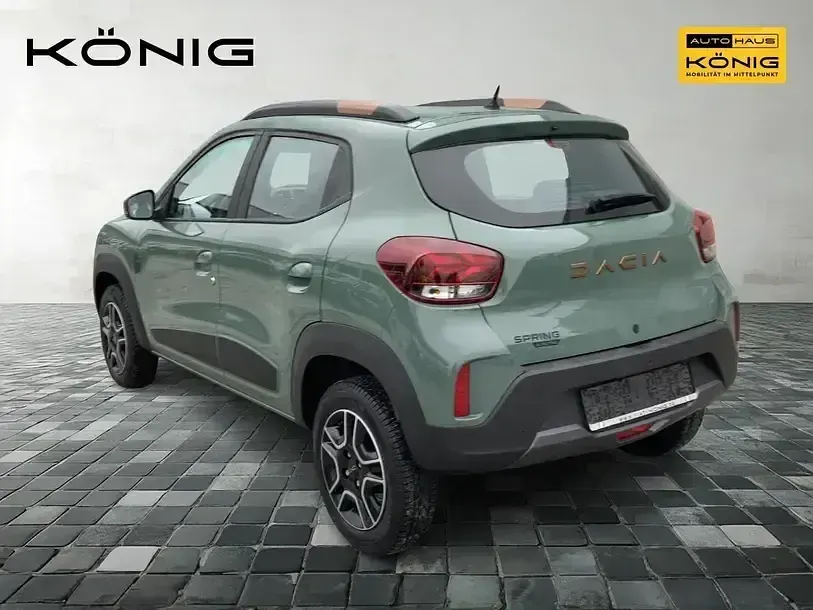 Gebraucht Dacia Spring Extreme 47 kW (65 PS) 2023 Olivgrün Kleinwagen
