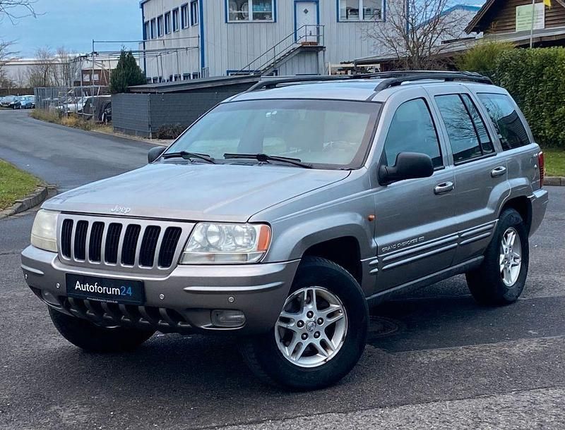 Grau Gebraucht 1999 Jeep Grand Cherokee SUV | 9.499 € (Etwas zu teuer) - Bild 1/4