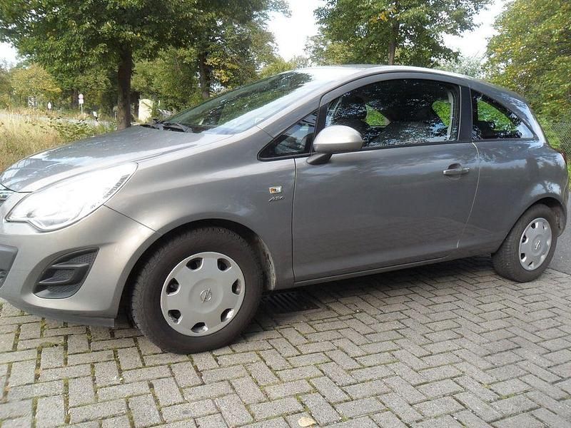 Gebraucht Opel Corsa Active 69 PS (50 kW) 2013 Braun Kleinwagen