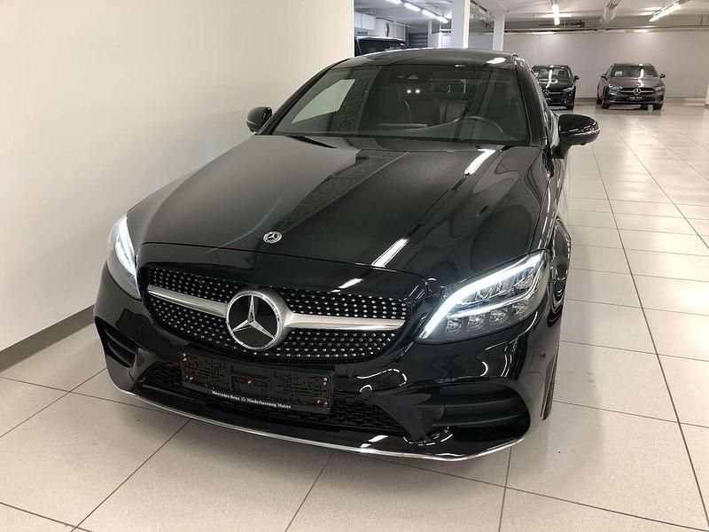 Schwarz Gebraucht 2022 Mercedes C180 AMG line Coupé | 34.390 € (Fairer Preis) - Bild 1/4