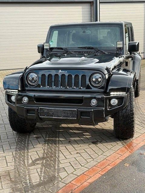 Schwarz Gebraucht 2014 Jeep Wrangler Unlimited SUV | 28.500 € (Fairer Preis) - Bild 1/4
